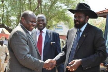 SPLM chairman Salva Kiir (R) greets former SG Pagan Amum (L) as Riek Machar looks on, January 14, 2010 