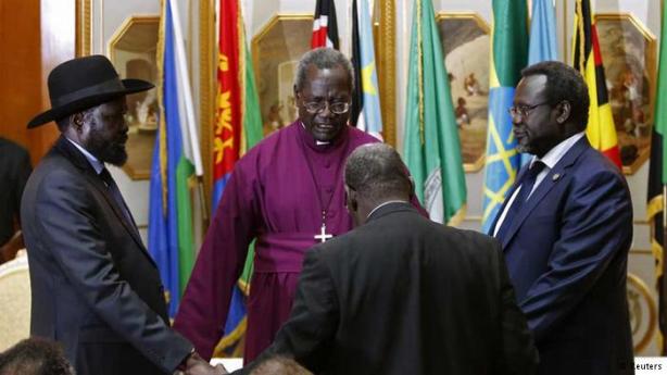 Bishop Deng Bul (in red), praying with President Kiir and Dr. Riek Machar, Addis Ababa, Ethiopia