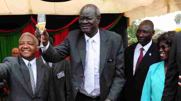 South Sudan's Minister of Higher Education, Science and Technology, Peter Adwok Nyaba (center), celebrates the first anniversary of the country's independence in Nairobi, capital of Kenya, on July 9, 2012.