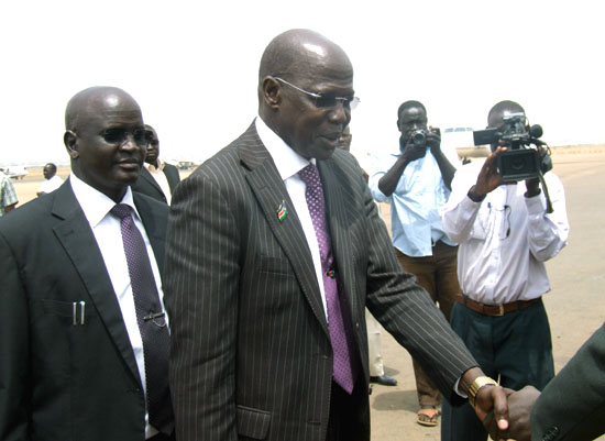 Governor Simon Kun Puoch (shaking hands) arrives at the Juba International Airport, 21 Feb 2012
